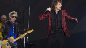Singer Mick Jagger , foreground, guitarist Keith Richards and drummer Charlie Watts, of British band, the Rolling Stones, perform at Real Madrid’s Santiago Bernabeu soccer stadium, in Madrid, Spain, June 25, 2014. 