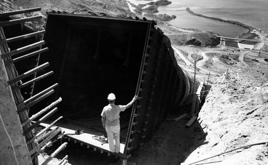 A worker surveys the construction of the Mark Wilmer pumping plant near Parker, Arizona in June 1982. The pump station pulls water from the Colorado River near Lake Havasu and sends it to the Phoenix area through the Central Arizona Project. In the 1960s, the system's architects warned that it would dry up in the 21st century, but their suggested fixes were ignored for decades.