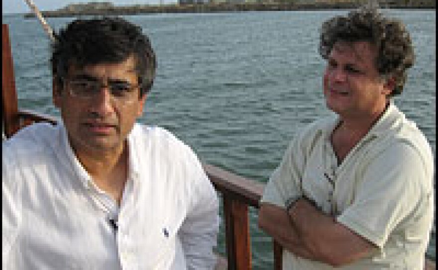 Adnan Asdar (left) and Tariq Alexander Qaiser are both making money off new development in Karachi.  "Development is good, but it has to be done sensitively," Qaiser says.