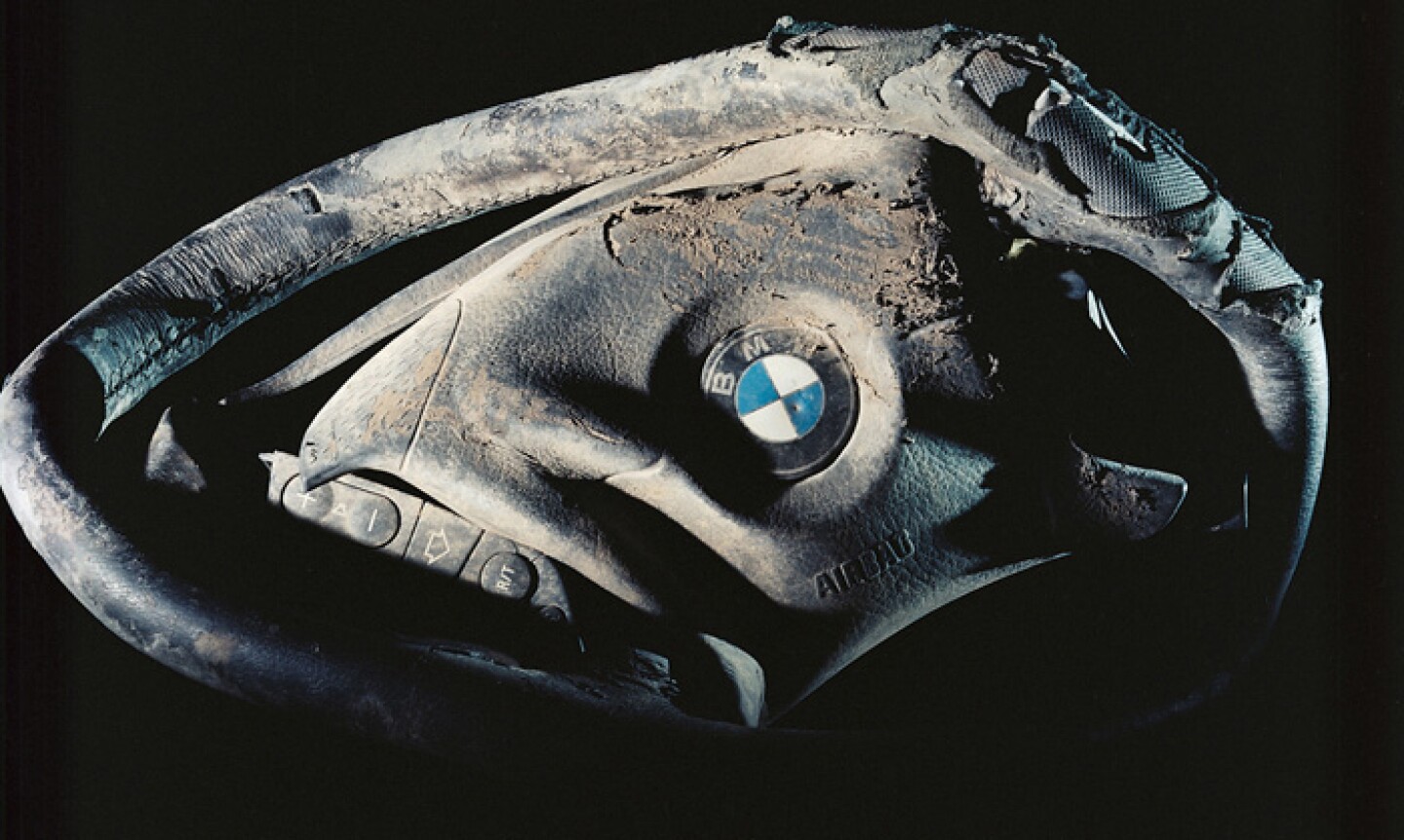 A crushed steering wheel recovered at the Fresh Kills Landfill in Staten Island where debris was taken by barge from the collapsed Twin Towers.