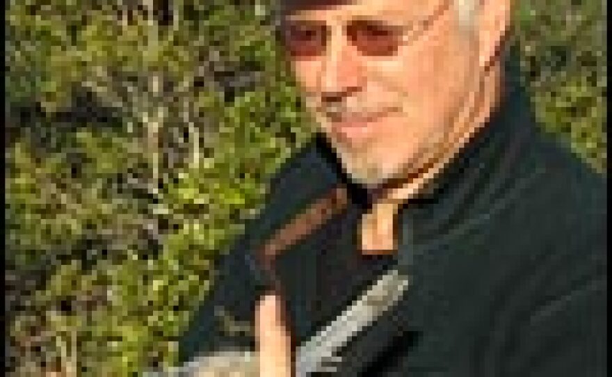 NPR's Chris Joyce releases a scrub-jay.