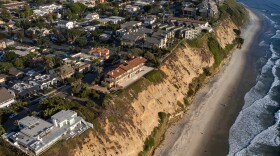 An aerial view of houses along a coastal bluff at Boneyard Beach in Encinitas on Sept. 3, 2024.