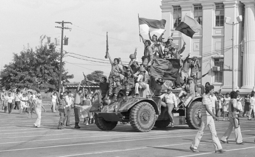 Sandinista rebels ride an armored vehicle through Managua, the Nicaraguan capital, on July 19, 1979, after ousting dictator Anastasio Somoza. Latin America has endured civil wars for the past six decades, but only two groups, the Sandinistas and Fidel Castro's rebels, ousted leaders by force.