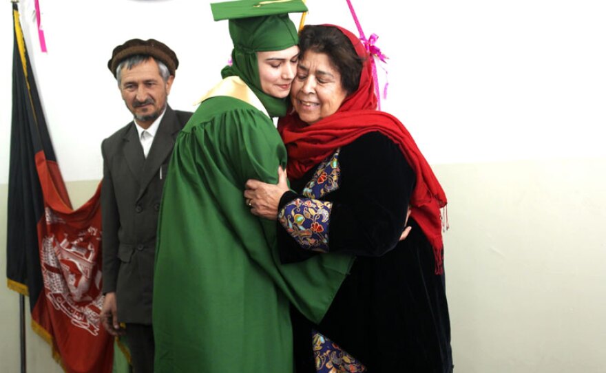School founder Razia Jan gets choked up as she hands out diploma's to the first graduating class.