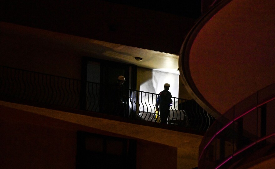 Rescue personnel work at the site on Thursday.