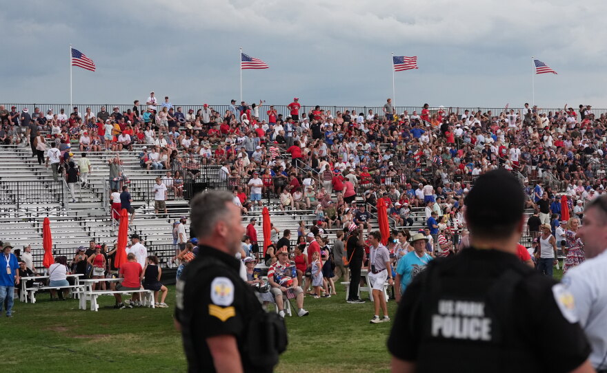 Law enforcement secure the area as people evacuate because of incoming storms that will delay the program at a Salute to America Independence Day event honoring the nation's 250th anniversary, Saturday, July 4, 2026, on the National Mall in Washington.