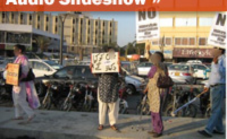 Dr. Awad Alvi sends these pictures from a flash protest he joined in Karachi. NPR obscured the faces to protect the people involved.