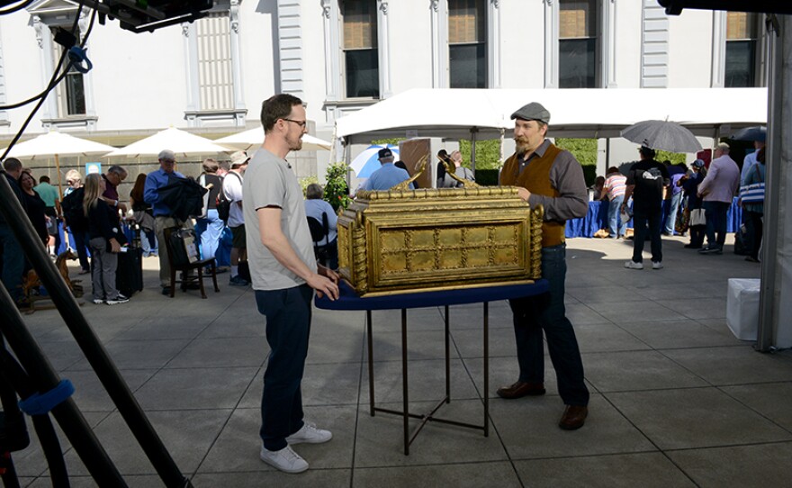 James Supp (right) appraises a 1981 "Raiders of the Lost Ark" prototype at Crocker Art Museum.  