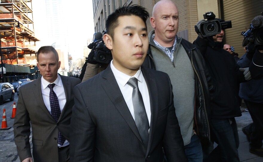 NYPD Officer Peter Liang arrives at Kings County Criminal Court in Brooklyn, N.Y., after being indicted for the fatal shooting of an unarmed man while patrolling the darkened stairwell of a Brooklyn housing project last November.