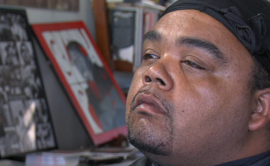"Reclaiming the Community" artist Big June gets a shave at the Imperial Barber Shop in Southeast San Diego, August 5, 2015.