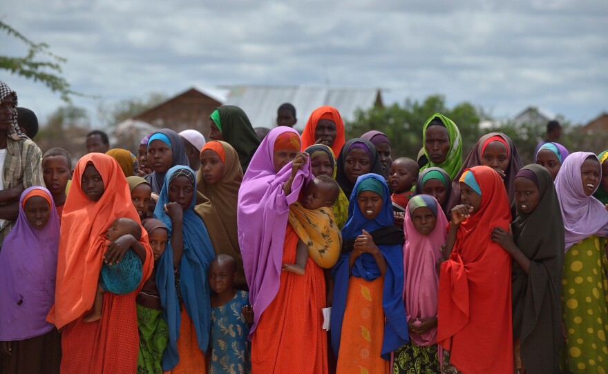 Somalis living in the Dadaab camp in Kenya gather to watch the arrival of the United Nations high commissioner for refugees last May.