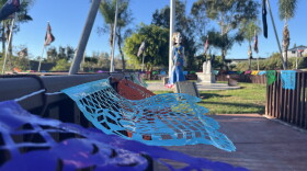 Papel picado, catrinas and other Dia de los Muertos decorations cover part of La Vista Memorial Park, Oct. 26, 2026.