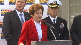 Lynn Reaser, chief economist with Point Loma Nazarene University, addresses the crowd during the release of the university's report on the shipping industry, Dec. 7, 2015. 