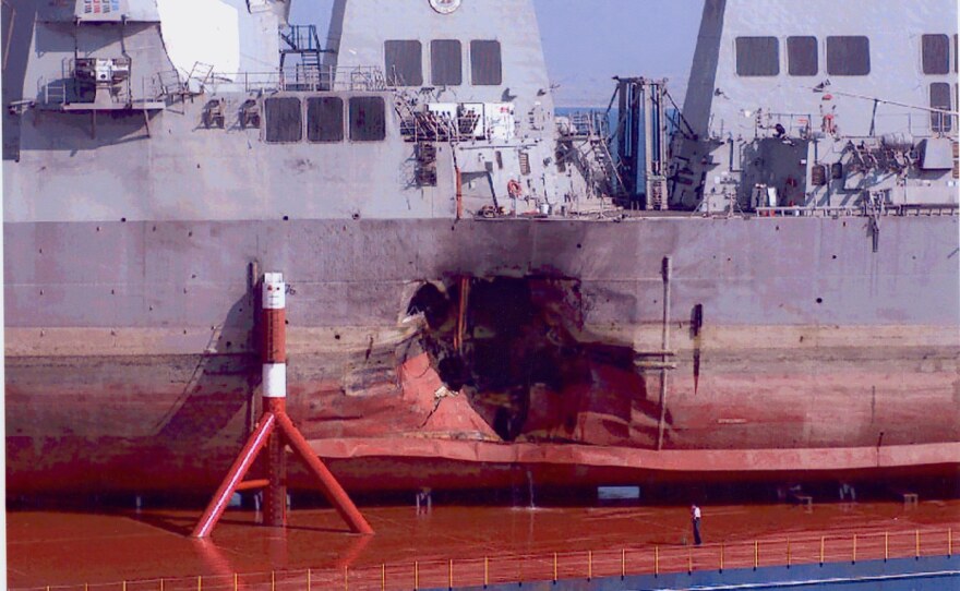 The damaged USS Cole is shown with a 45-foot hole in its side following an Oct. 12, 2000, terrorist bombing in Yemen that killed 17 sailors is pictured in this undated photo.