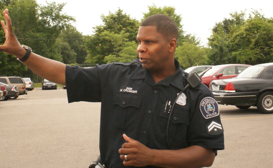 Officer Michael Crowder says his roots are too deep to leave Detroit, but he knows younger officers who were lured away by better pay.