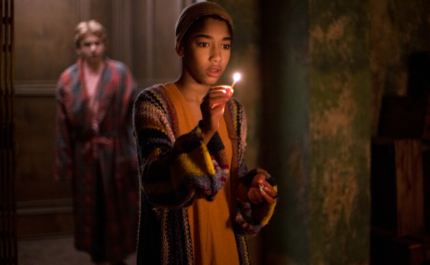 Actors Igby Rigney and Iman Benson, who play Kevin and Ilonka, venture out after curfew at the Brightcliffe hospice center in the new Netflix series <em>The Midnight Club.</em>