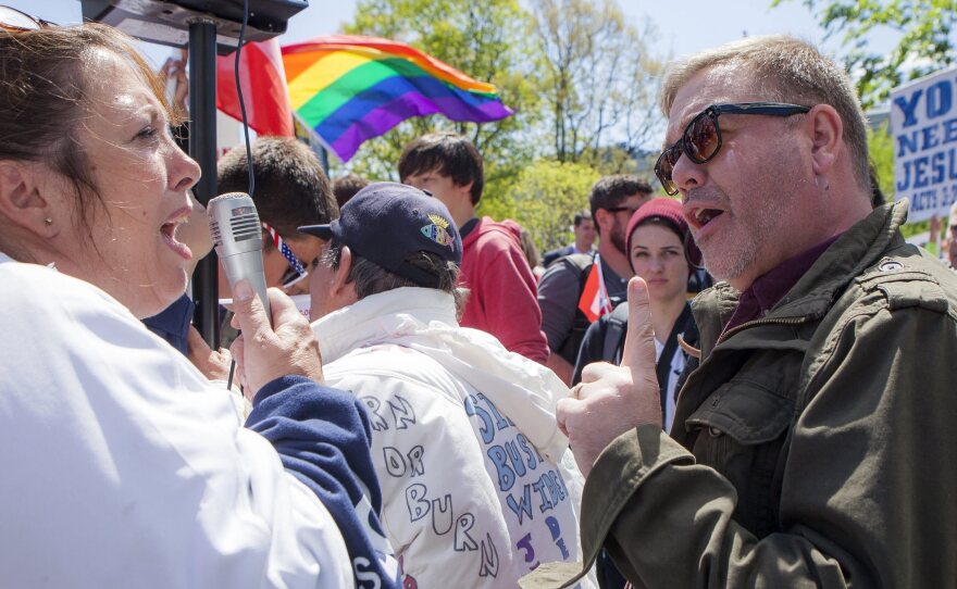 The Supreme Court will rule on same-sex marriage next month; here, Reverend Scott Hopkins, right, of United Methodist Church in Vienna, Va., voices his support of gay marriage as Tracy Grisham, of Amarillo, Texas, voices her disapproval.