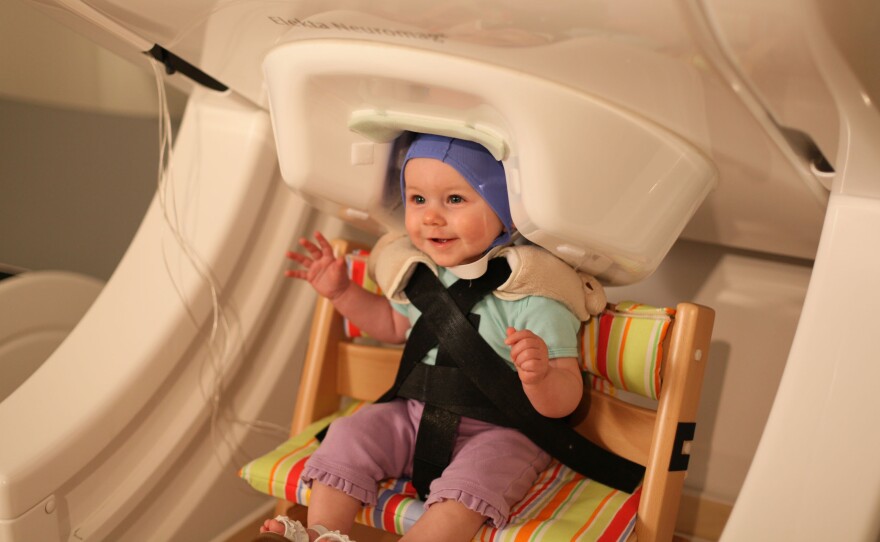 The magnetoencephalograph can record electrical signals from a baby's brain without requiring the child to be perfectly still.