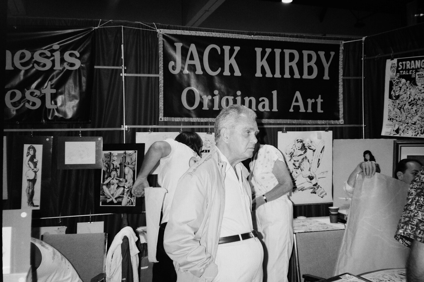 Comic book artist Jack Kirby displays his work at the 1992 Comic-Con Convention.