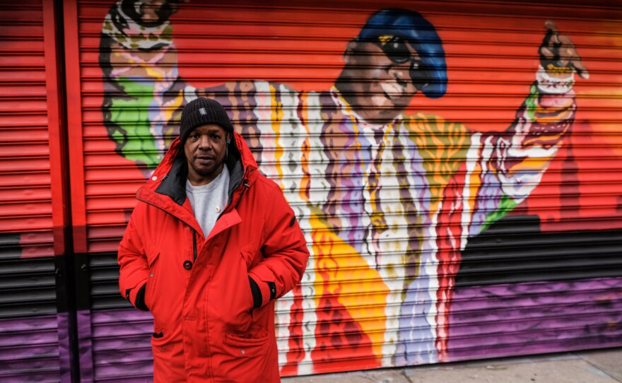 Preme is a rapper and DJ who early on, fought in rap battles with B.I.G. He stands on Fulton Street & St. James Place, the area where Biggie grew up.