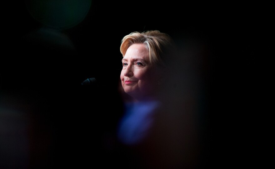 Democratic presidential candidate Hillary Clinton pauses while speaking at a Rainbow PUSH Women's International Luncheon on Monday.