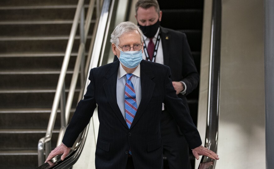 Senate Minority Leader Mitch McConnell, seen here on Feb. 23, has called House Speaker Nancy Pelosi's proposal for a commission to study the events of Jan. 6 "a "bizarre, partisan concept."