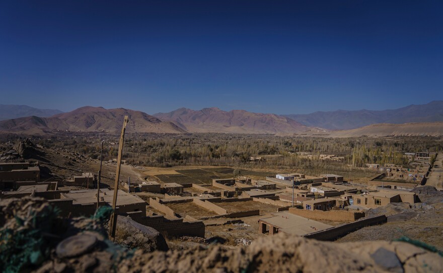 A view of what the locals call the "green zone," an area Afghan National Police say is controlled by the Taliban, as seen from a police outpost along the Kabul-Kandahar highway, outside Maidan Shahr, Afghanistan, on Nov. 7, 2020.
