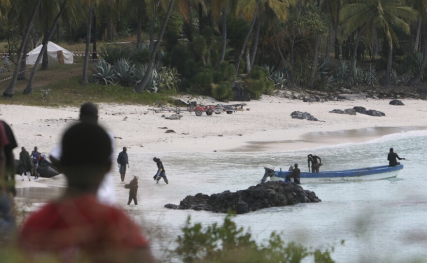 Rescuers gather at Galawa Beach, about 22 miles from Moroni, Comoros, July 1, 2009, as they prepare to search the area after a Yemenia Airbus passenger plane crashed into the Indian Ocean off the island nation of Comoros as it attempted to land in the dark amid howling winds.