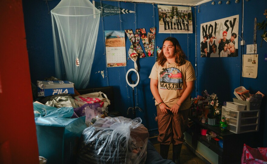 Climate activist and Pajaro Valley High School senior Denia Escutia, 18, looks around her mud-coated bedroom in Pajaro, California on March 24, 2023. Days earlier, residents began returning to their homes after a levee breach flooded the area several weeks earlier.