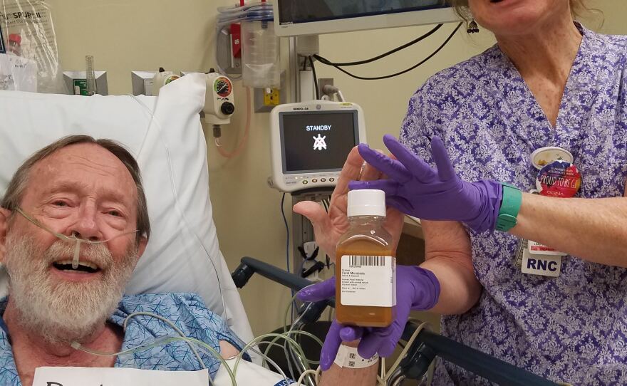 Robert Hyde Sr. holds a bottle containing his fecal transplant at Sharp Grossmont Hospital on April 7, 2017.