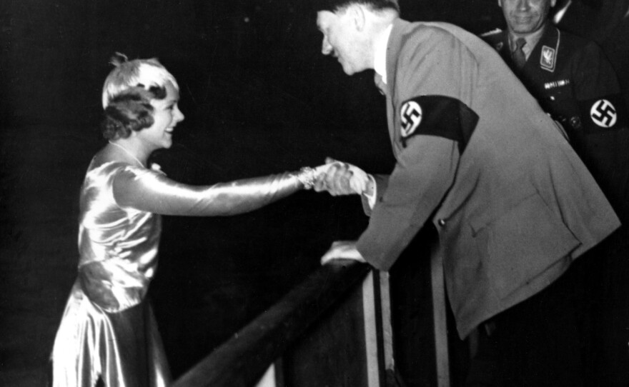 Adolf Hitler shakes hands with Sonja Henie following her exhibition in Berlin in 1934.