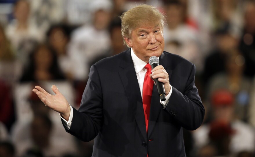 Donald Trump speaks during a campaign rally in Iowa. He will once again be a focus of the GOP debate, especially after his call to ban all Muslims from entering the U.S.
