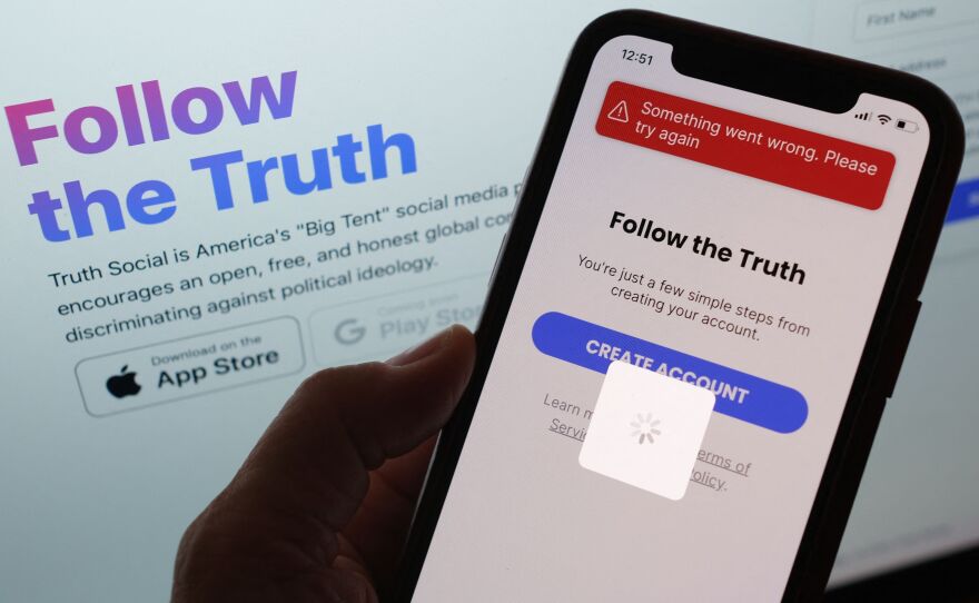 Some users experienced glitches on former President Donald Trump's new social media app Truth Social as it launched Monday.