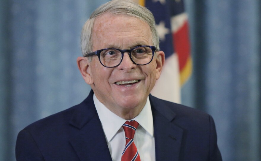 Ohio Gov. Mike DeWine answers reporters' questions in Columbus, Ohio, on Jan. 6.