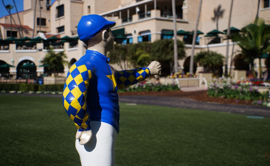 A statue of a jockey stands outside a track in Del Mar on Nov. 17, 2023.