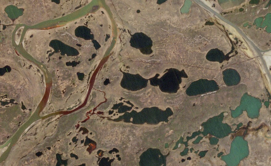 This photo released by European Space Agency captured on May 31, by the Copernicus Sentinel-2 mission shows the extent of the oil spill, in red, near a power plant in the Siberian city of Norilsk, Russia. Russian President Vladimir Putin has declared a state of emergency in a region of Siberia after an estimated 20,000 tons of diesel fuel spilled from a power plant storage facility.