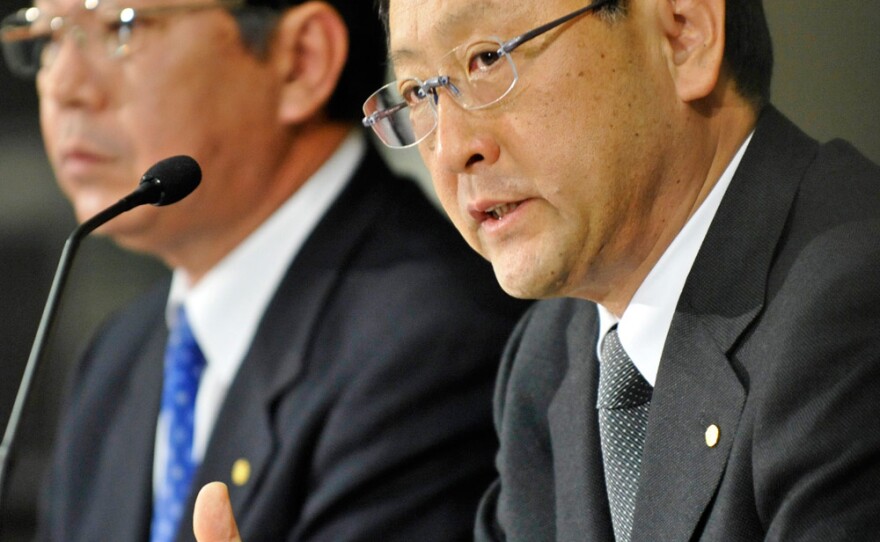 Toyota Motor President Akio Toyoda (right), with Vice President Shinichi Sasaki, answers questions during a news conference in Tokyo on Feb. 17 to provide an update on the progress of massive recalls.