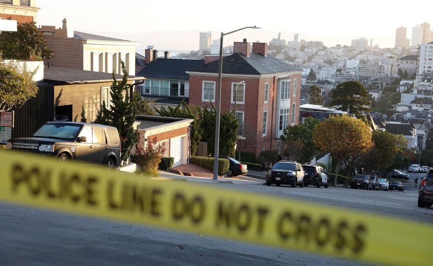 Police tape is seen in front of the home of House Speaker Nancy Pelosi and her husband, Paul Pelosi, on Friday in San Francisco. Paul Pelosi was violently attacked in their home by an intruder.