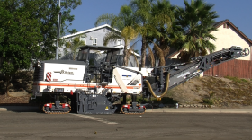 The city of San Diego's new milling and paving machine can grind down up to 2.5 inches of asphalt as it moves forward at a pace of 80 feet per minute, October 9, 2014.