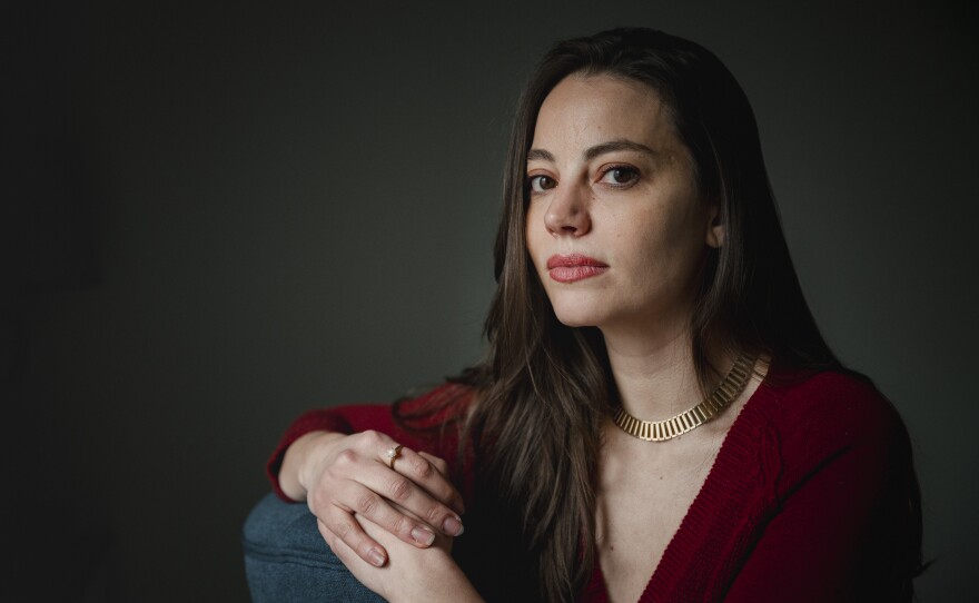 Natasha Danielá de Lima McGlynn, executive director of Anti-Violence Partnership of Philadelphia, sits at the main office in Philadelphia on Tuesday, March 26, 2024.