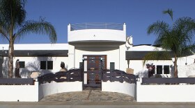 Even the front gate of Nassar Pirasteh's La Jolla home is a sculpture as seen in this undated photo.
