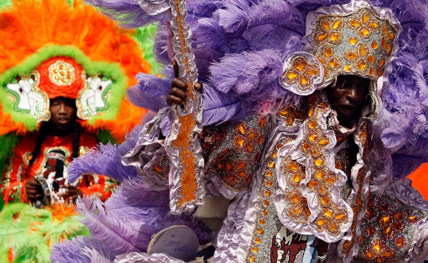 Members of the Wild Red Flame Mardi Gras Indians, photographed during Jazz Fest in 2008.