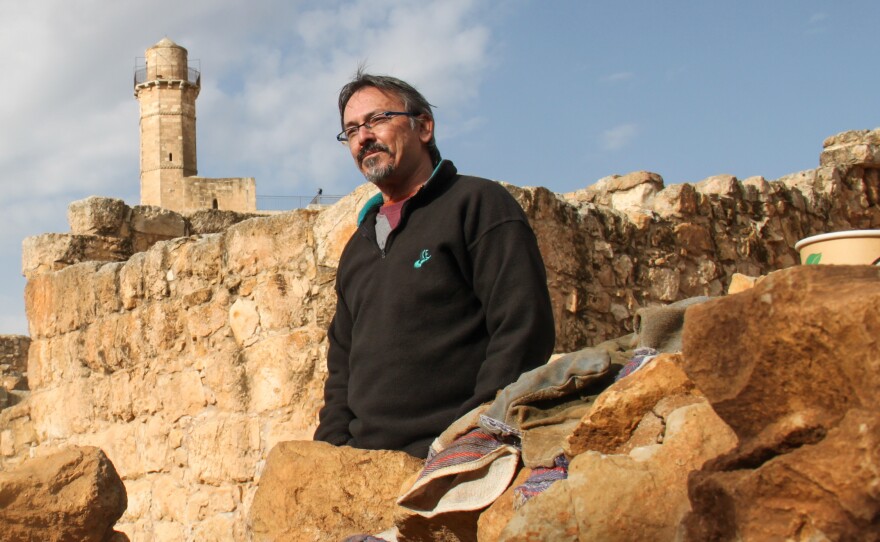 Benny Har-Even, the Israeli military's deputy archaeologist, stands among the ruins of a village dating to the 2nd century B.C.