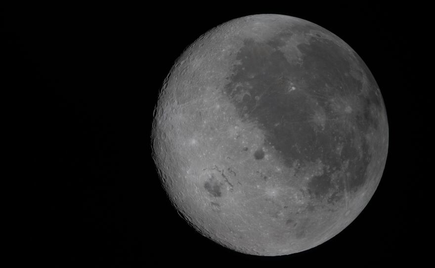 April 6: This image shows the moon, the near side (the hemisphere we see from Earth) visible at the right side of the disk, identifiable by the dark splotches. At lower left is Orientale basin, a nearly 600-mile-wide crater that straddles the moon's near and far sides. Everything to the left of the crater is the far side.