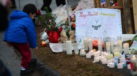 A makeshift shrine honors the victims of a elementary school shooting that happened Friday in Newtown, Conn.