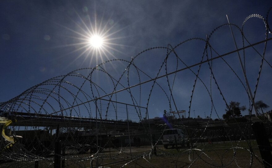 Concertina wire stretches through Shelby Park on Feb. 4, 2024, in Eagle Pass, Texas.