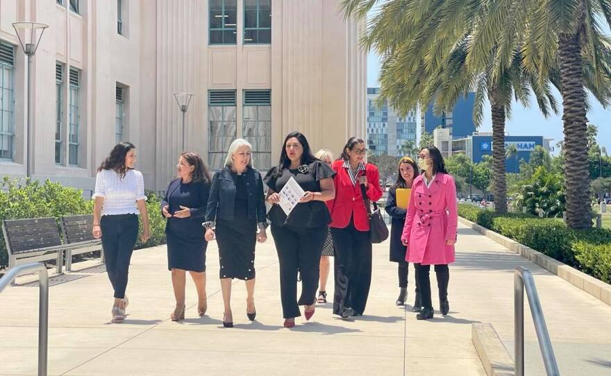 Mana De San Diego and Vice Chair Nora Vargas are pictured walking outside the San Diego County Administration Building on , July 12, 2021.