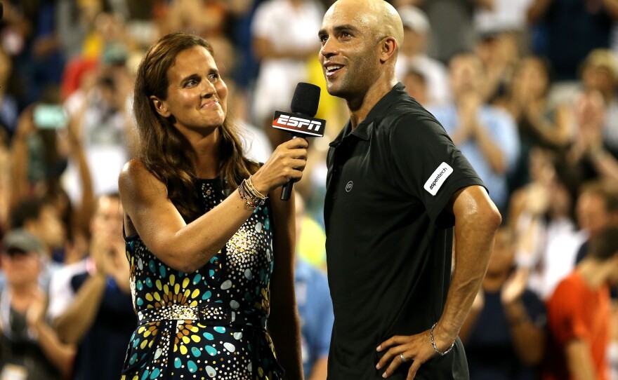 James Blake addresses the crowd during an interview with Mary Joe Fernandez after losing on day three of the 2013 U.S. Open.