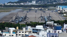U.S. MV-22 Osprey transport aircraft are parked at the U.S. Marine Corps Air Station Futenma in Ginowan, on the main island of the Okinawa archipelago, southern Japan, Tuesday, Feb. 18, 2025.