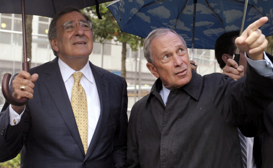 New York City Mayor Michael Bloomberg (right) shows Panetta the World Trade Center Memorial.